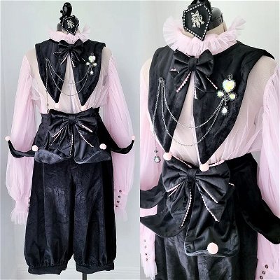 Our black x pink Jester Apron & Collar with Haenuli blouse, Kaneko pants, and Puvithel brooch 🖤

Just posting another reminder to check your emails shipment details to finalize your addresses! Shipments are beginning this weekend so I want to make sure at least one post reaches everyone who pre-ordered 😊