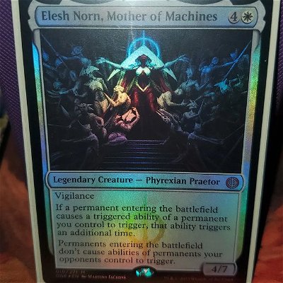 Elesh Norn graced my collector booster box tonight on stream! I'm actually thinking of building her as a commander. I'm sure it's not an original thought but it will be fun (for me) none the less!

Hail Phyrexia! 

Check me out on mylinks.ai/StevenDraws 

#mtglife #edh #mtgedh #magicthegatheringcommunity #commander #eleshnorn #monowhite
