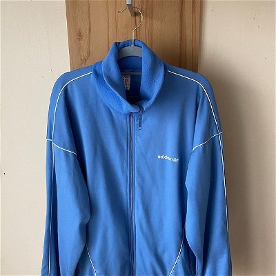 Blue adidas Track Top 🌐🧊❄️ Size M, Price €32
In excellent condition, ideal festival wear ⛺️ 
Great value, open to offers 💴 
Nationwide postage available 😆
Plenty more similar items available on our page