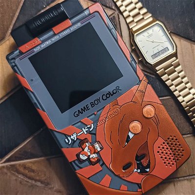 Sharing my #DailyDriver on #ArtistShellSaturday while taking on the @moddedgameboyclub Pokémon pinball competition. Oh and #GameboyAndCasio since I don't leave the house without either of these items lately.

- Custom UV Printed shell by me
- PokeBall DPad by @visualpixel.co 
- Orange glitter buttons by @gameboy.7777

Hope everyone is having a great weekend and enjoying the new Pokemon Scarlet and Violet games! I should be receiving my copy by tomorrow! 🙏🏻 Anyone else team Quaxly? 🦆💧
.
.
.
_____________________________________________________
#charizard #pokemon #pokemoncommunity #pokemonred #pokemontcg #pokemonscarlet #pokemonviolet #quaxly #pokemonpinball #moddedgameboygameboyclub #gameboycommunity #gameboycolor #moddedgameboy #gbc #gamemoymodder #casio #aq230 #aq230ga #retrogames #retrogamer #retrogamingcommunity #retrogamingcollective #videogames #customgameboy #90spokemon #firetypepokemon #gameboygames