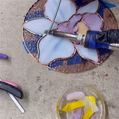 It’s super dreary and overcast today but here’s some clips of my process with the orchid suncatcher ☺️ She’s officially looking for a home 
.
.
.
.
#stainedglass #glassart #glassartist #orchidlover #orchidcollector #cattleyaorchid #orchidea #copperfoil #soldering #processvideo #artprocess #handmadewithlove #orchidart #flowerlovers #holidayshopping #shophandmade #reelsinstagram