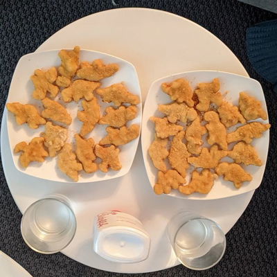 A romantic dinner of dinosaur chicken nuggets and chick-fil-a sauce ❤️