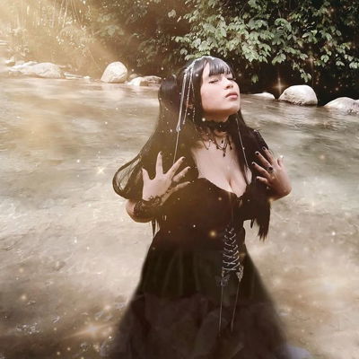 I made an original character cosplay based on my imagination 🖤

Character: Black Fairy Priestess of the South

Origin: The guardian of the dark deep beneath the fortress of Forest. Those who provoke the rules of nature shall be punished by its surrounded  black smokes of power which its opponents' life will be sucked until it's dry like the trunks of trees. And its light will turn you blind.

Photo & Edit: Yours truly
Device Used: Phone Camera + Timer + Pose 😎

#cosplay #fairycore #fairy #fairycosplay #originalcosplay #blackmage #black #outfitideas #cosplayphotography #phonephotography #cosplayer #cosplaygirl #fairylights #fairygarden