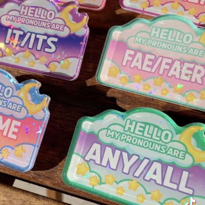 I know you probably already have a million pronoun pins… but… are they 2.5 inches wide, sparkly, dreamy, and starry? #pronounsmatter #neopronouns #behuman #onelove #identity #acrylicpin #pincollector #kawaiiaesthetic #prettyshinythings
