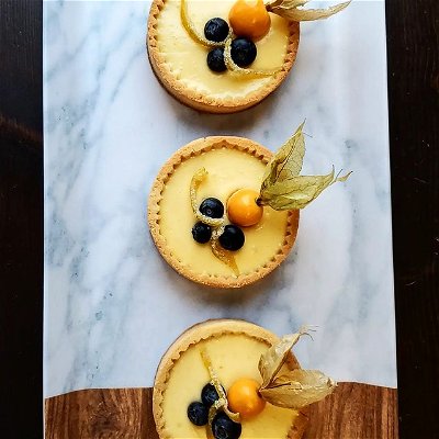 Lemon ricotta tart  with blueberries and a gooseberry 🤤🤤

#lemon #lemontart #ricotta #ricottatart #blueberry #gooseberries #bakery #baker #delicious